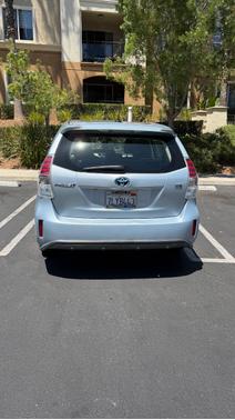 Blue 2015 Toyota Prius v Four