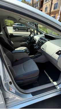 Blue 2015 Toyota Prius v Four