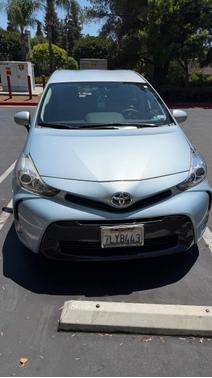 Blue 2015 Toyota Prius v Four