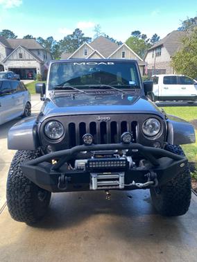 Gray 2016 Jeep Wrangler Unlimited Sport