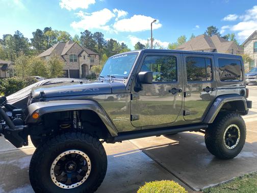 Gray 2016 Jeep Wrangler Unlimited Sport