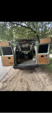Beige 2006 Ford E350 Super Duty XL Wagon