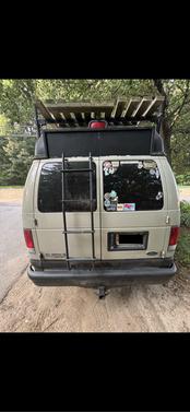 Beige 2006 Ford E350 Super Duty XL Wagon