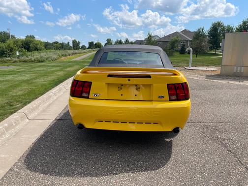 Yellow 1999 Ford Mustang GT