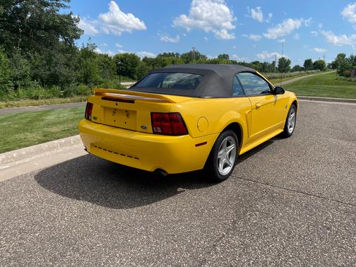 Yellow 1999 Ford Mustang GT