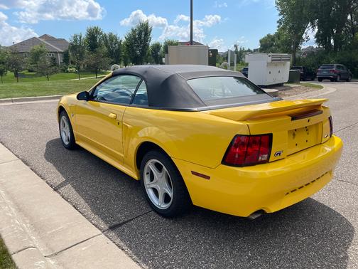 Yellow 1999 Ford Mustang GT
