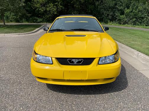 Yellow 1999 Ford Mustang GT
