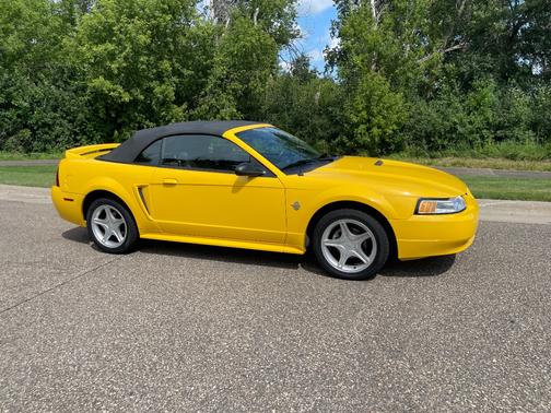 Yellow 1999 Ford Mustang GT