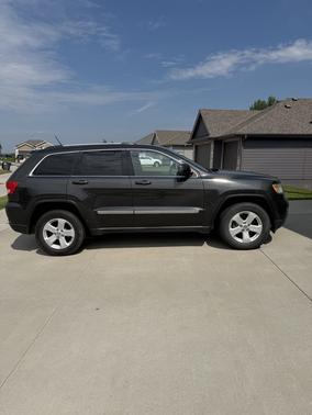 Black 2011 Jeep Grand Cherokee Laredo