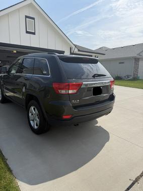 Black 2011 Jeep Grand Cherokee Laredo