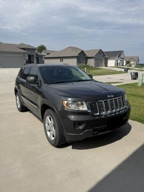 Black 2011 Jeep Grand Cherokee Laredo
