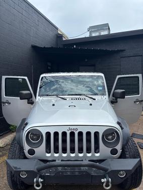 Silver 2011 Jeep Wrangler Sport
