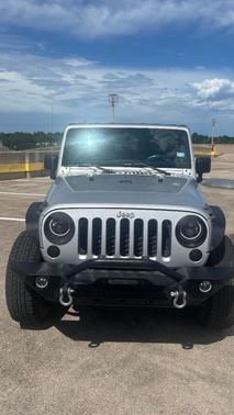 Silver 2011 Jeep Wrangler Sport