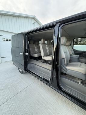 Black 2019 Nissan NV Passenger NV3500 HD SL V8