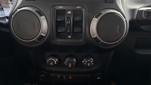 Black 2014 Jeep Wrangler Unlimited Sport