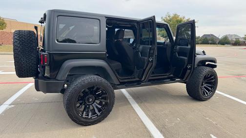Black 2014 Jeep Wrangler Unlimited Sport