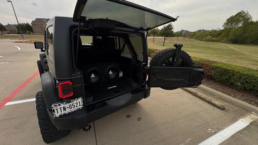 Black 2014 Jeep Wrangler Unlimited Sport