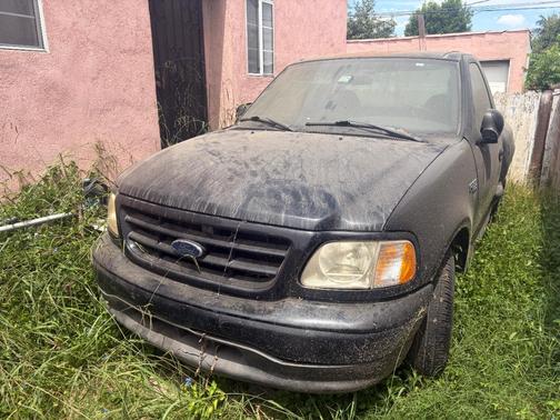 Black 2003 Ford F-150 XLT Flareside