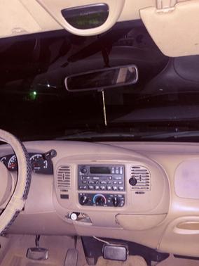 Red 2001 Ford F-150 Lariat SuperCrew