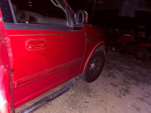 Red 2001 Ford F-150 Lariat SuperCrew