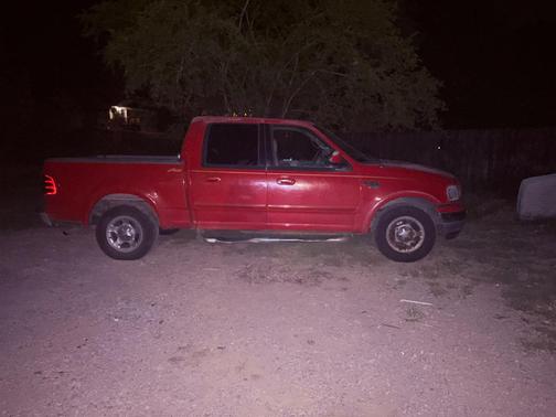 Red 2001 Ford F-150 Lariat SuperCrew
