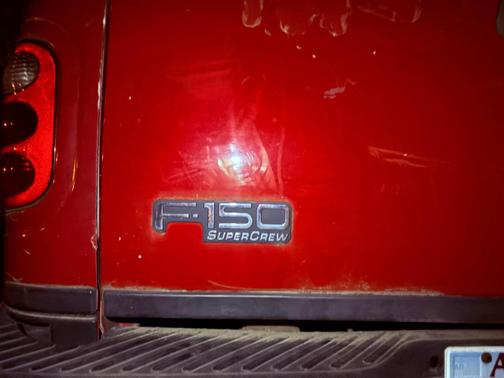 Red 2001 Ford F-150 Lariat SuperCrew