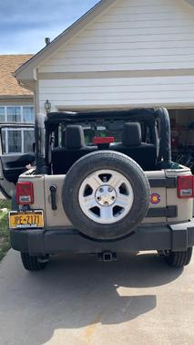 Beige 2016 Jeep Wrangler Sport