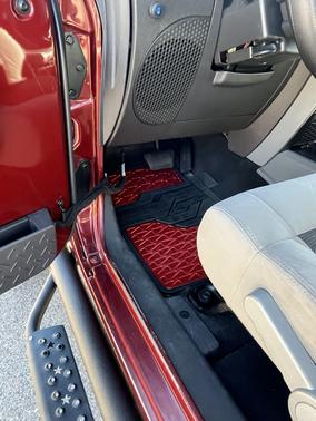 Red 2010 Jeep Wrangler Unlimited Sport