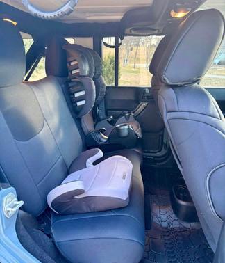 Blue 2014 Jeep Wrangler Unlimited Sport