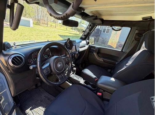 Blue 2014 Jeep Wrangler Unlimited Sport