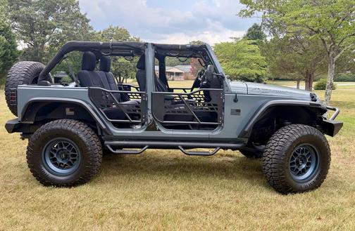 Blue 2014 Jeep Wrangler Unlimited Sport