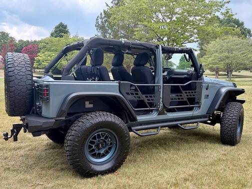 Blue 2014 Jeep Wrangler Unlimited Sport