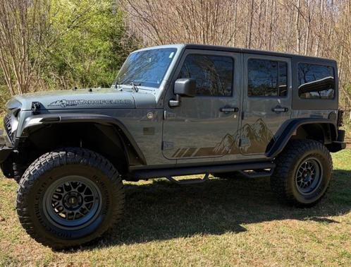 Blue 2014 Jeep Wrangler Unlimited Sport