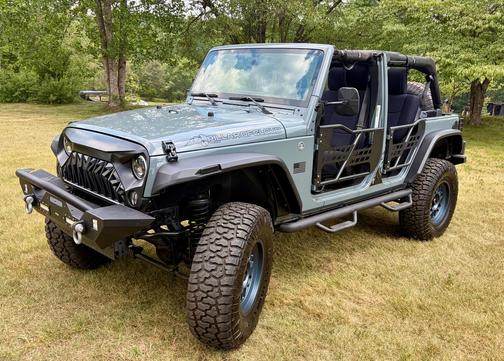 Blue 2014 Jeep Wrangler Unlimited Sport