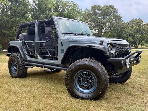 Blue 2014 Jeep Wrangler Unlimited Sport