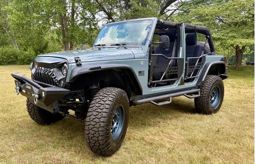 Blue 2014 Jeep Wrangler Unlimited Sport