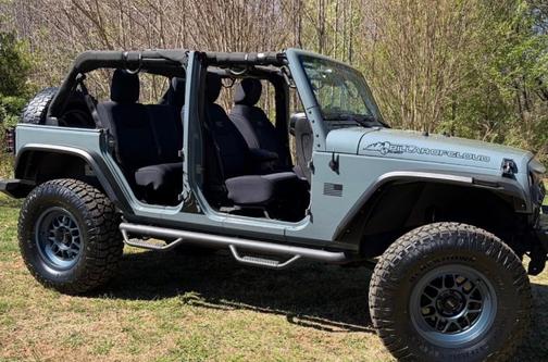 Blue 2014 Jeep Wrangler Unlimited Sport