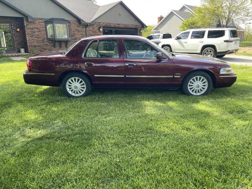 Red 2010 Mercury Grand Marquis LS