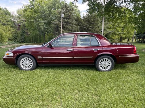 Red 2010 Mercury Grand Marquis LS