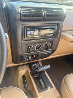 Red 2002 Jeep Wrangler SE