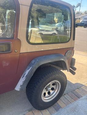Red 2002 Jeep Wrangler SE