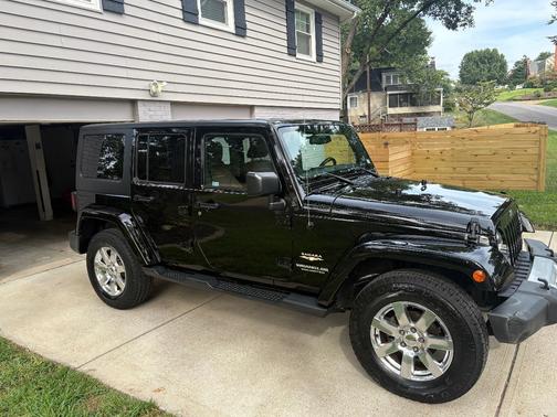 Black 2015 Jeep Wrangler Unlimited Sahara