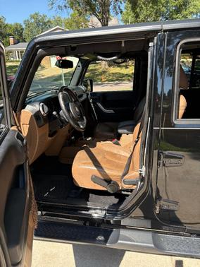 Black 2015 Jeep Wrangler Unlimited Sahara
