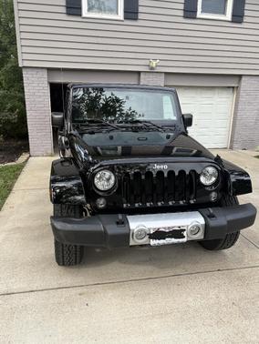 Black 2015 Jeep Wrangler Unlimited Sahara