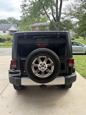 Black 2015 Jeep Wrangler Unlimited Sahara