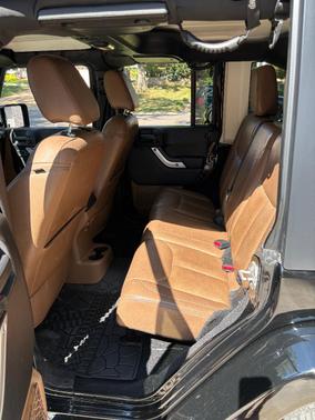 Black 2015 Jeep Wrangler Unlimited Sahara