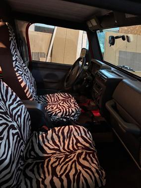 Red 2005 Jeep Wrangler Sport