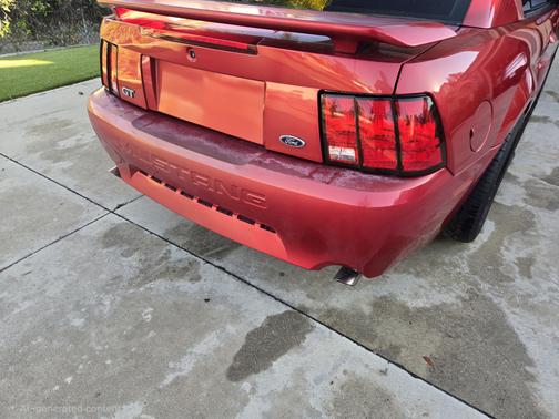 Red 2002 Ford Mustang GT
