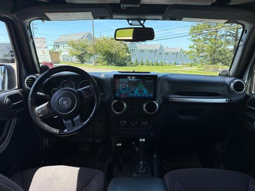 Gray 2014 Jeep Wrangler Unlimited Sahara