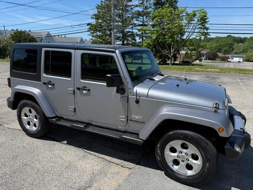 Gray 2014 Jeep Wrangler Unlimited Sahara